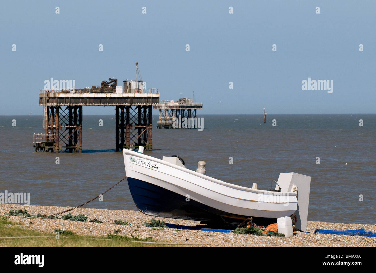 A fishing boat beached on Sizewell beach in Suffolk. Stock Photo