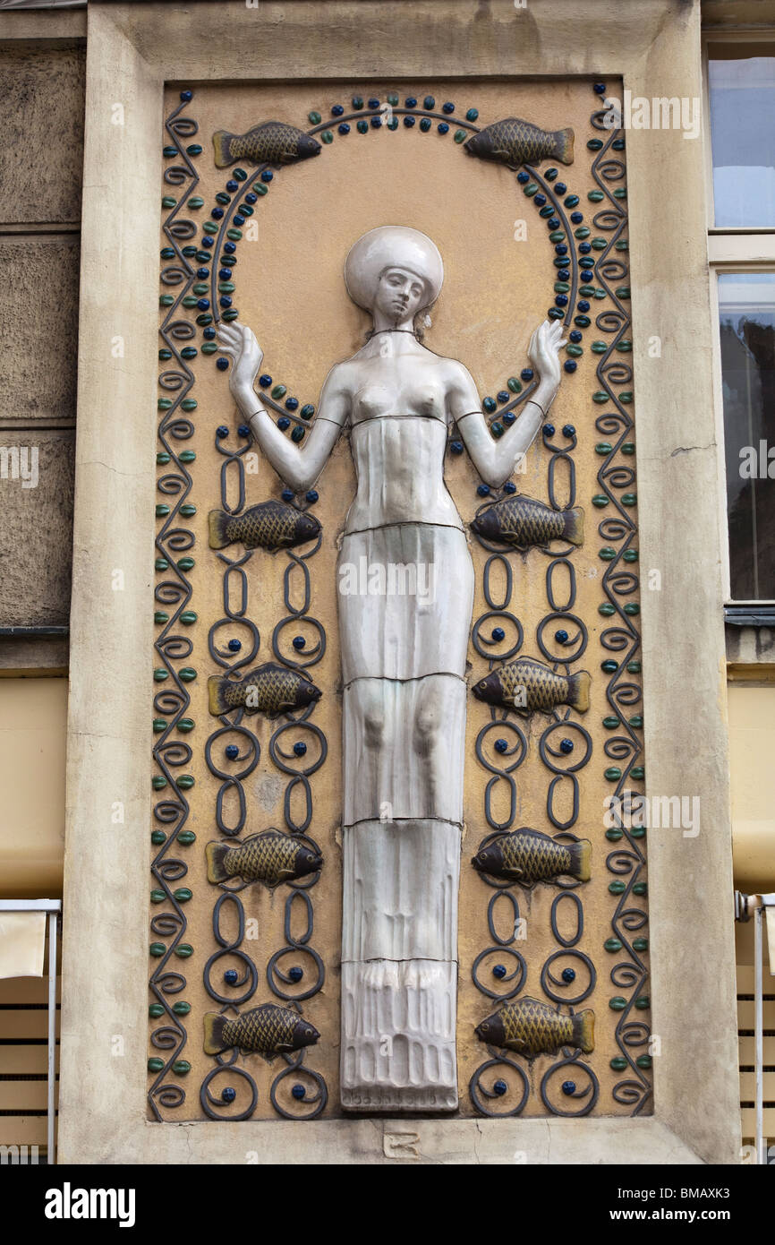 detail of sculpture on facade of apartment block, 9 Kaprova Street, Prague, Czech Republic Stock Photo