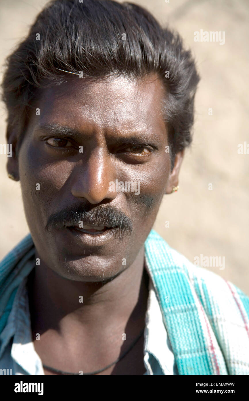 Black tribal man ; Bheel basti ; village Dilwara ; Udaipur ; Rajasthan ; India Stock Photo