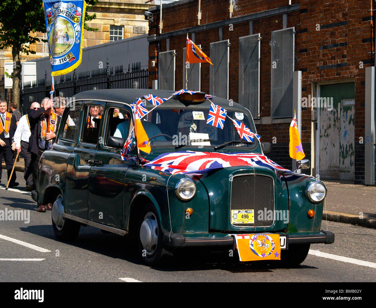 Orangefest, 12th July 2009 Orange parade through the center of Belfast. Just one of the many parades in Northern Ireland. Stock Photo