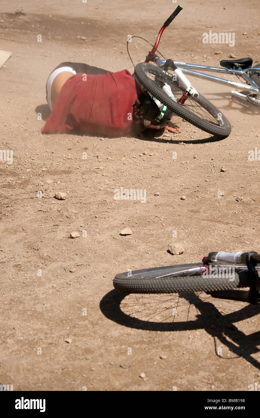 bicycle stunt crash, injured rider, dirt, pain, bike Stock Photo Alamy