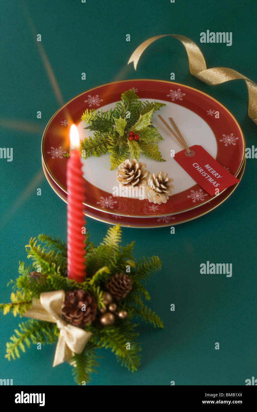 Christmas Candle and Plate Stock Photo