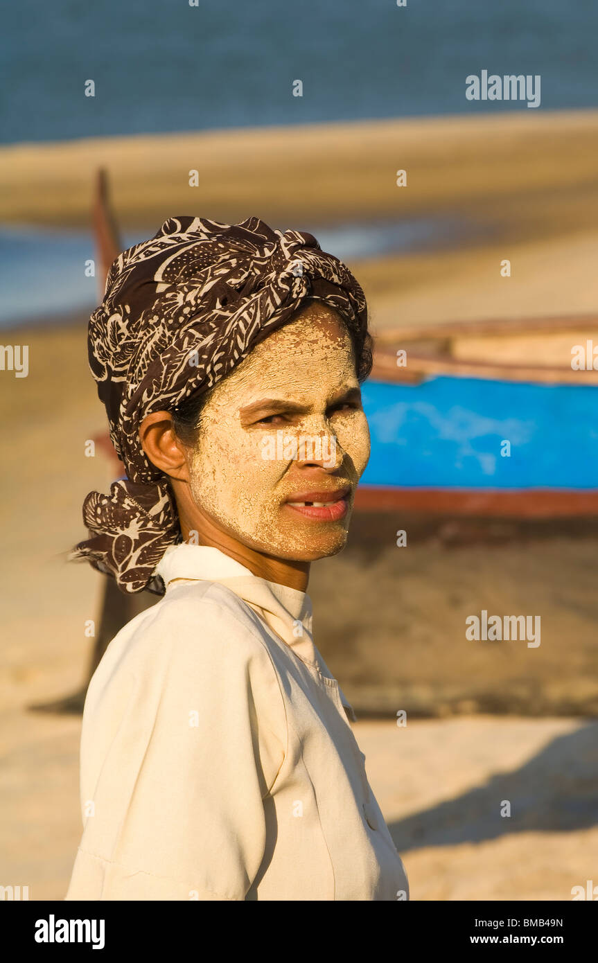Woman face with sun protection near a fishing village, Morondava, Madagascar Stock Photo