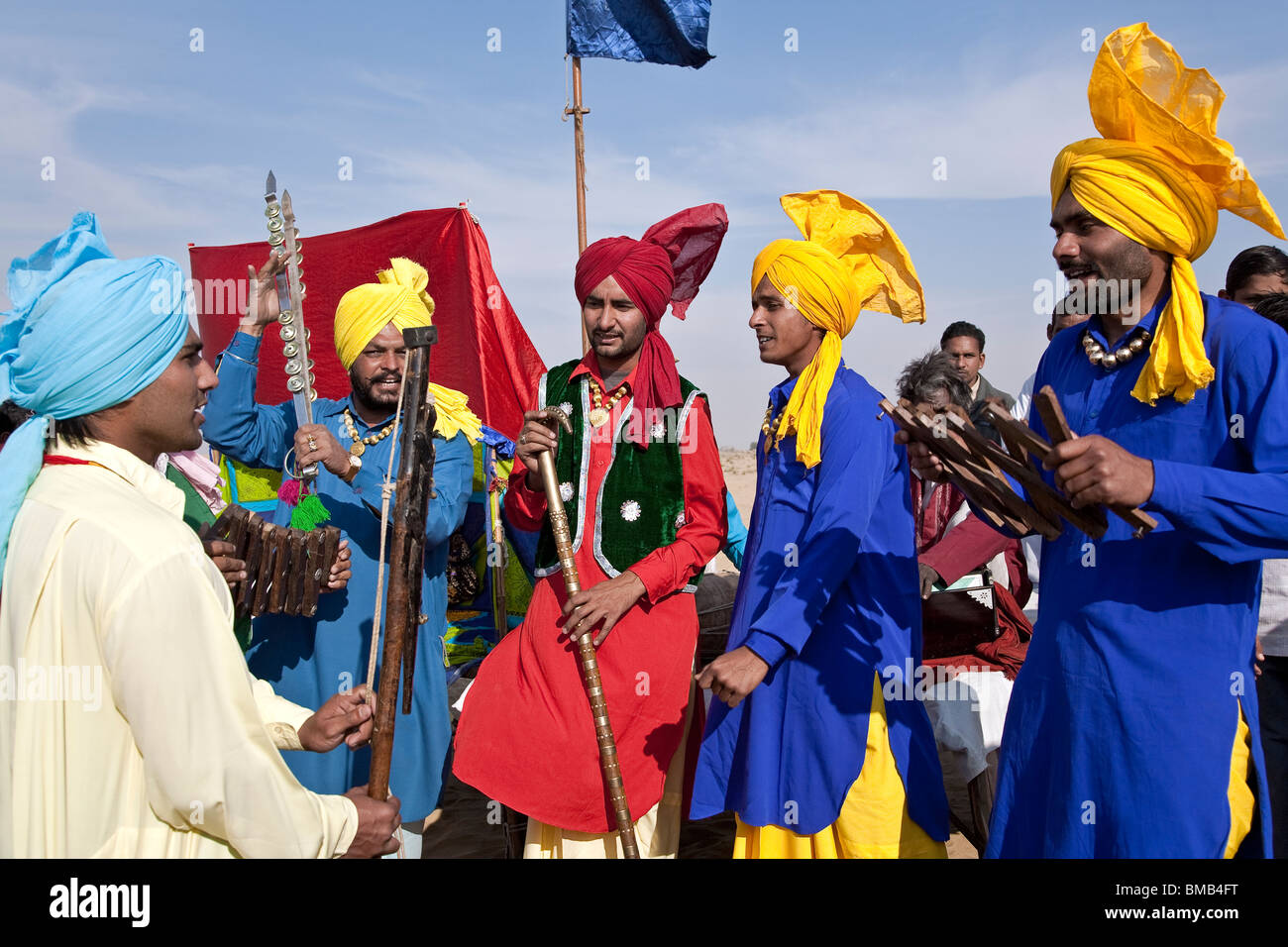 Indian musicians playing traditional instruments. Bikaner Desert Festival. Rajasthan. India Stock Photo