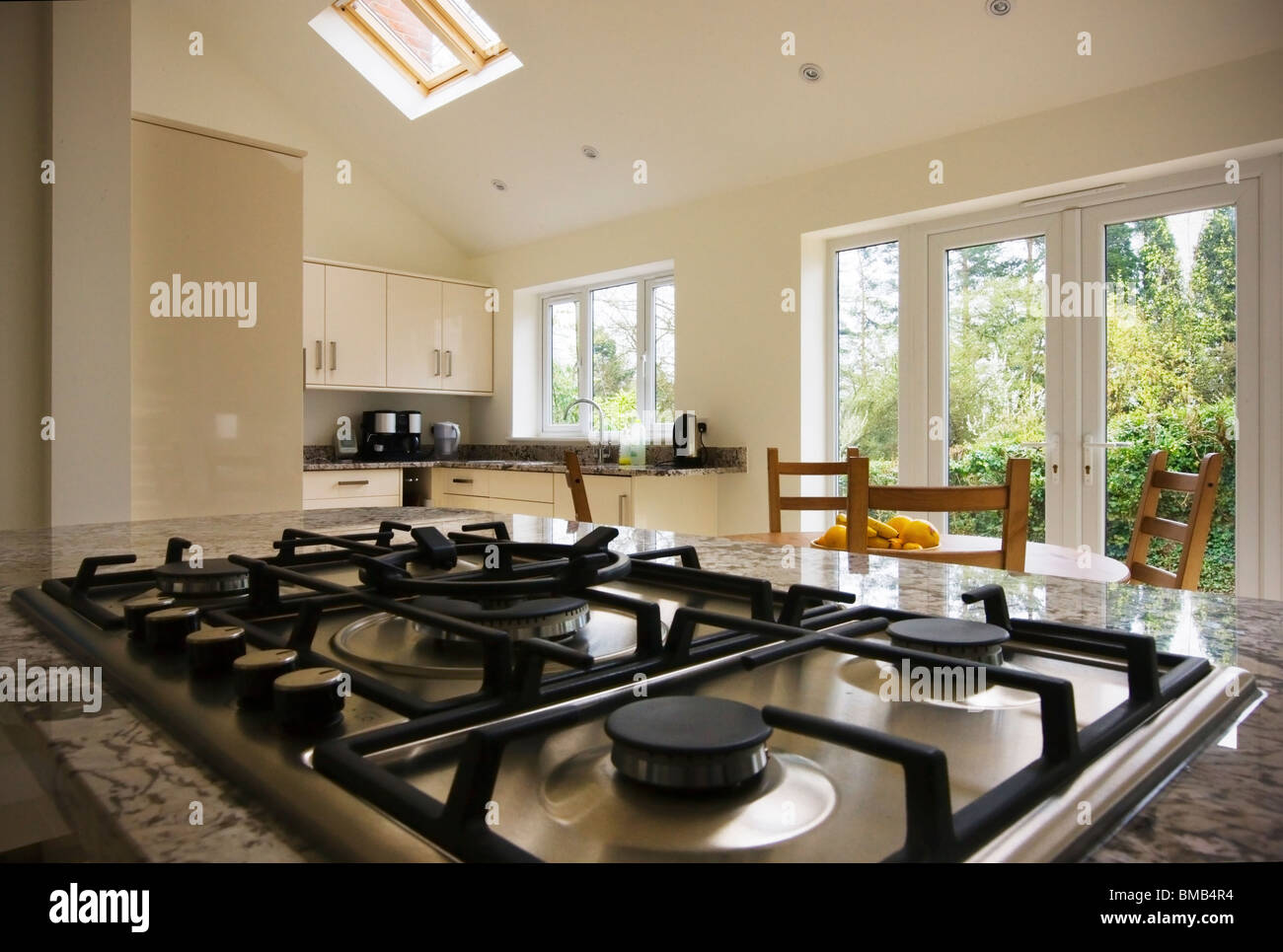Wide Angle View Of A New Modern Kitchen Extension With Vaulted