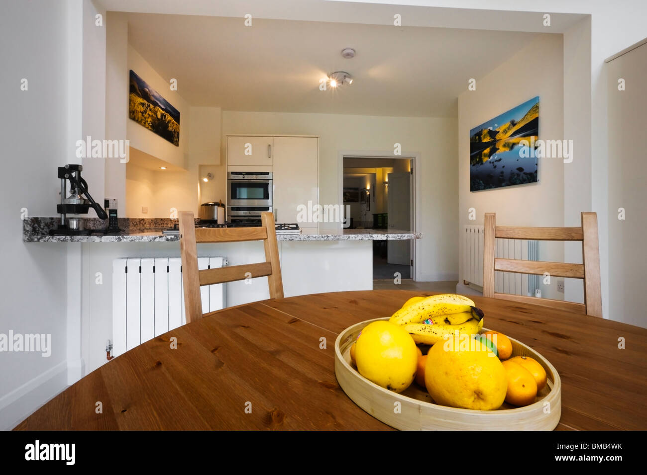 Wide Angle View Of A New Modern Kitchen Extension With Vaulted