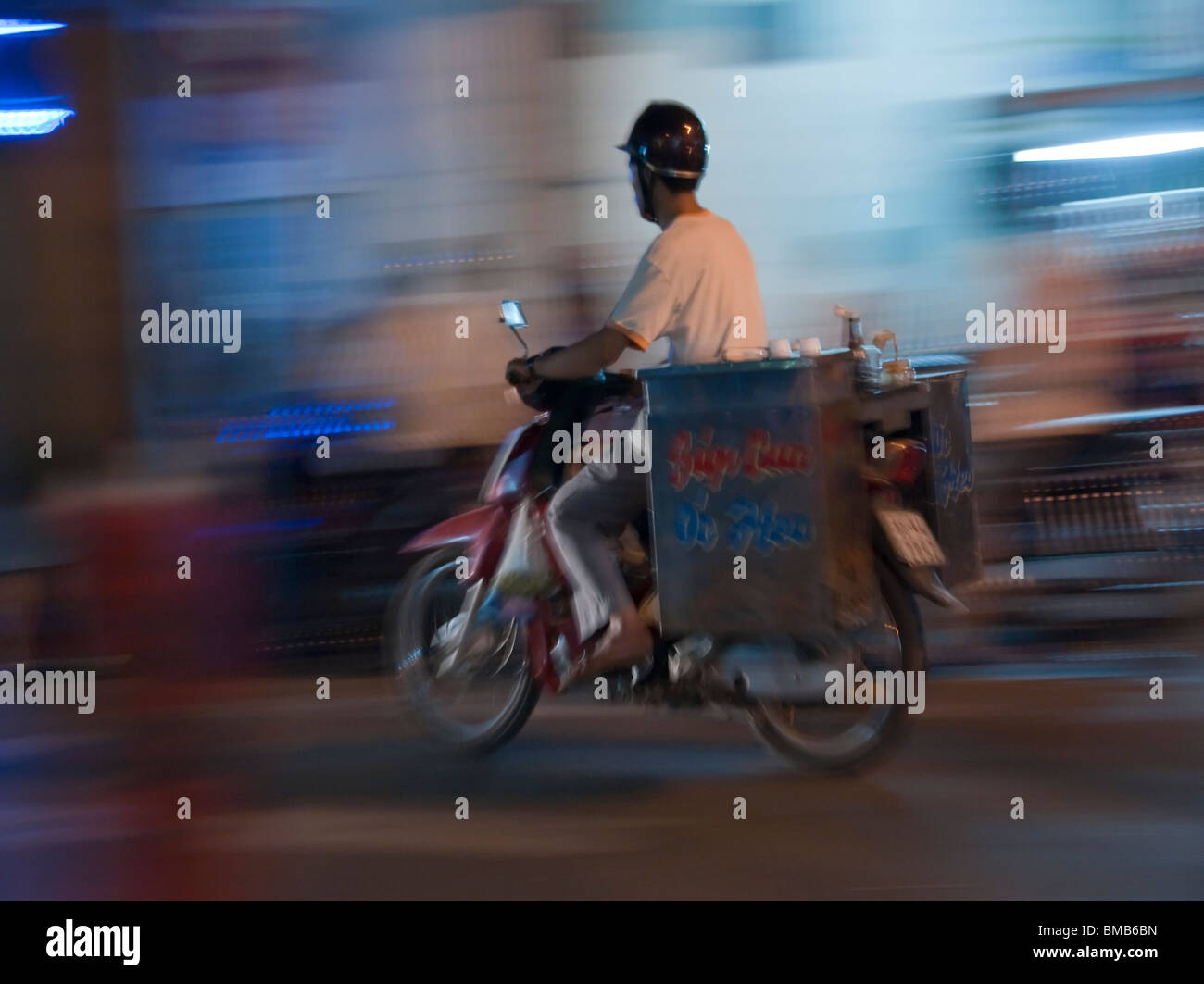 Motorbike deliveries, Ho Chi Min City, Saigon, Hoi An Vietnam Stock Photo