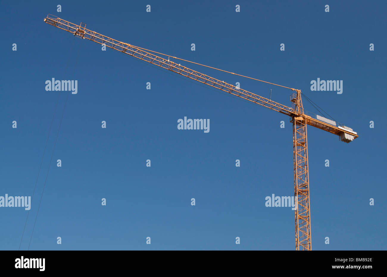 Blue sky crane, construcion is under progress Stock Photo