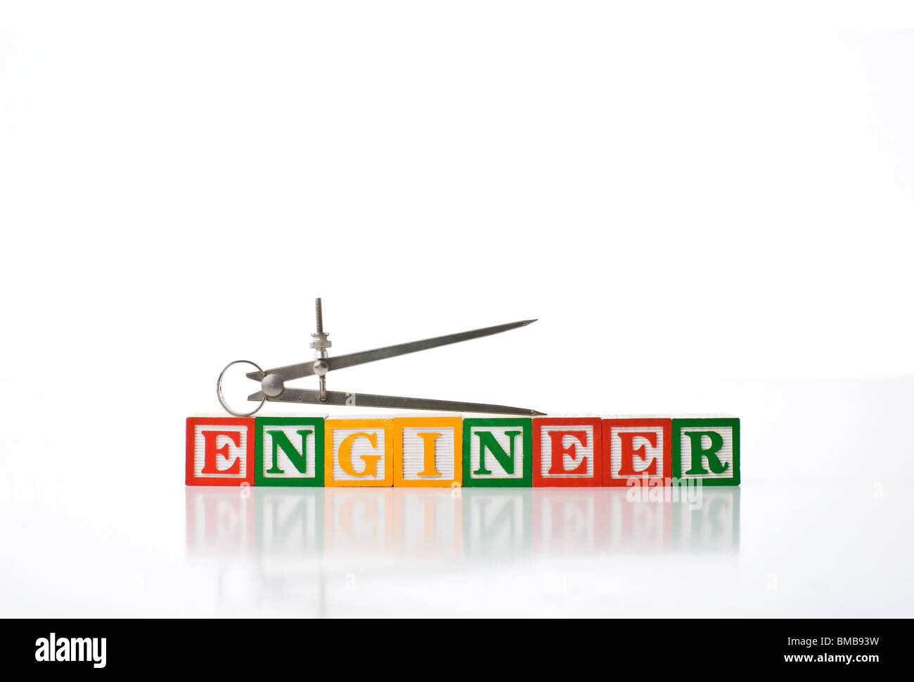 Colorful children&rsquo;s blocks spelling ENGINEER with a divider Stock 