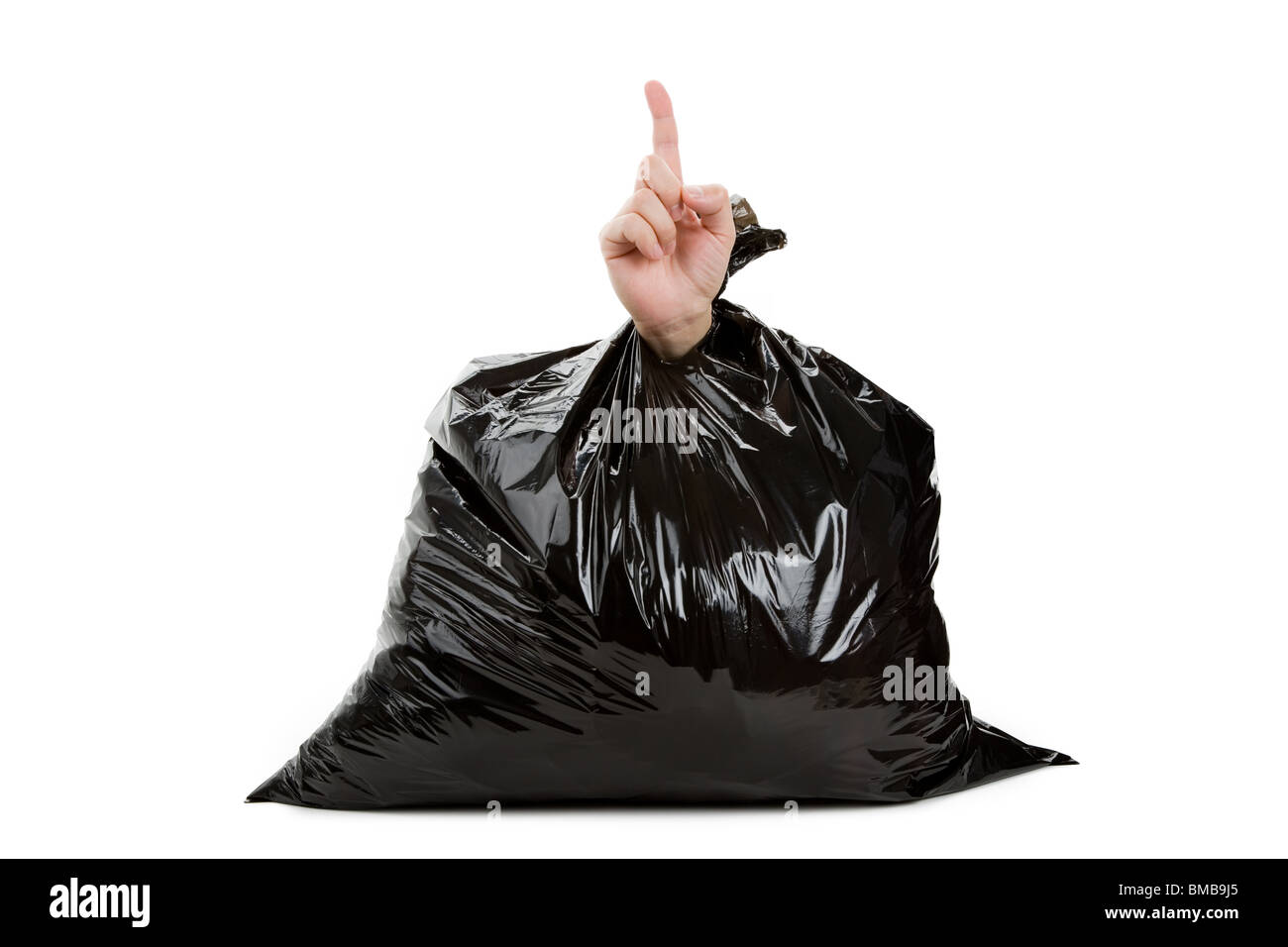 Black Garbage Bag and hand, concept of Loser Stock Photo