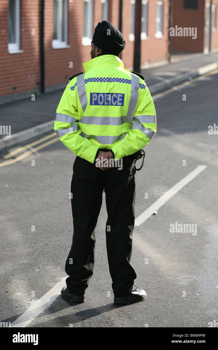 sikh police officer on patrol leicestershire Stock Photo
