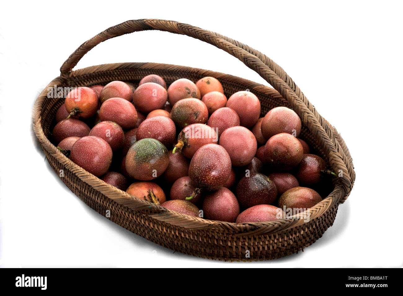 Ripe Passion-fruit in a basket Stock Photo