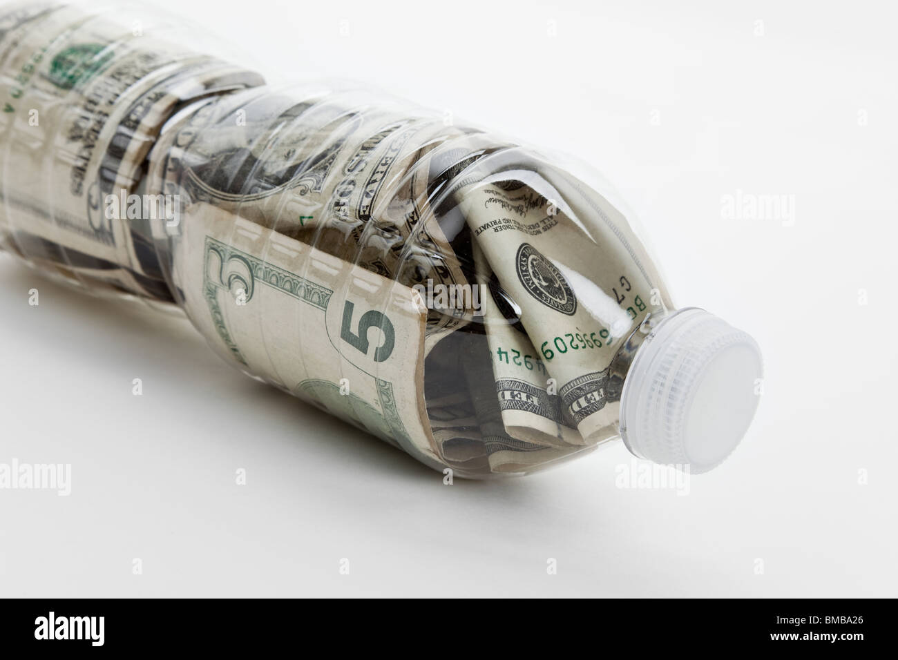 Plastic Bottle and Dollar with white background Stock Photo Alamy