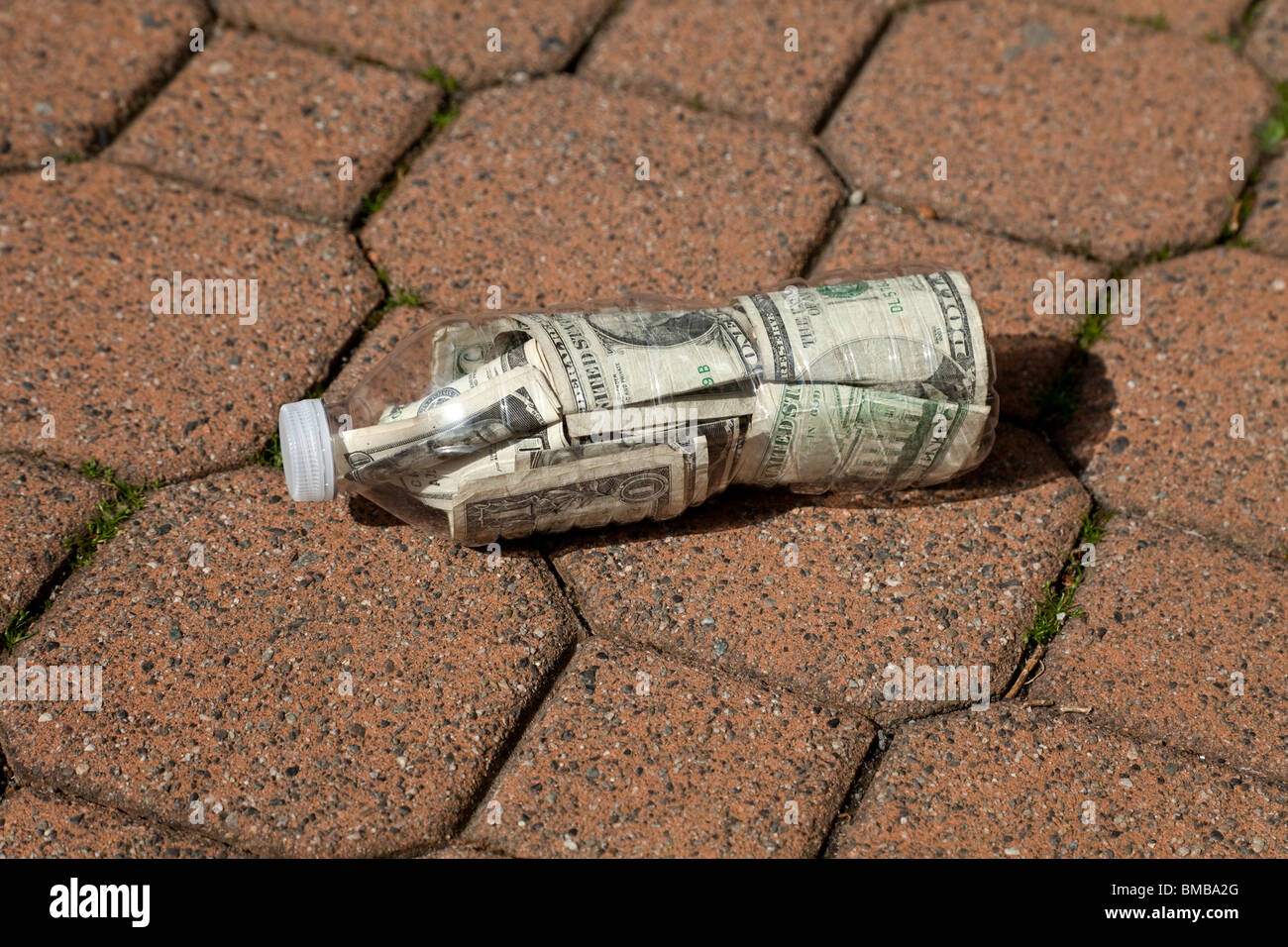 Plastic Bottle and Dollar close up Stock Photo Alamy