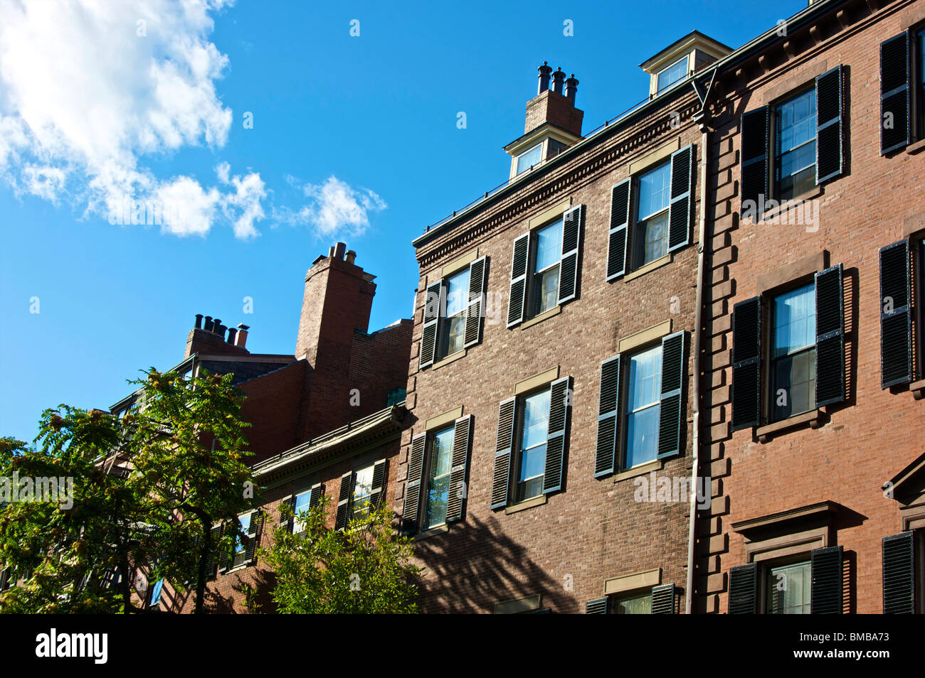 old boston row houses and brownstones on a sunny afternoon in
