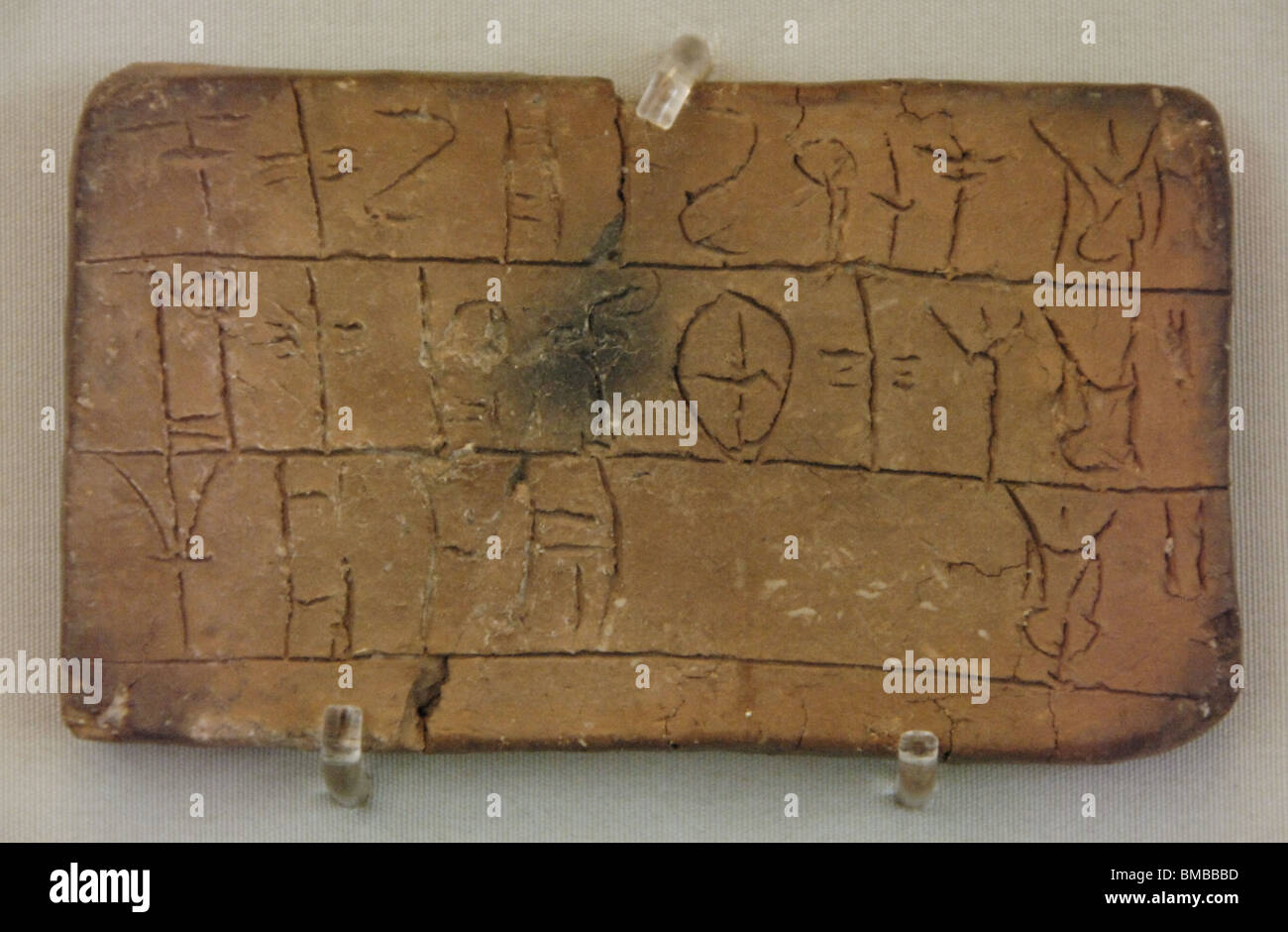Clay tablet inscribed with mycenaean Linear B script. National Archaeological Museum. Athens. Greece. Stock Photo