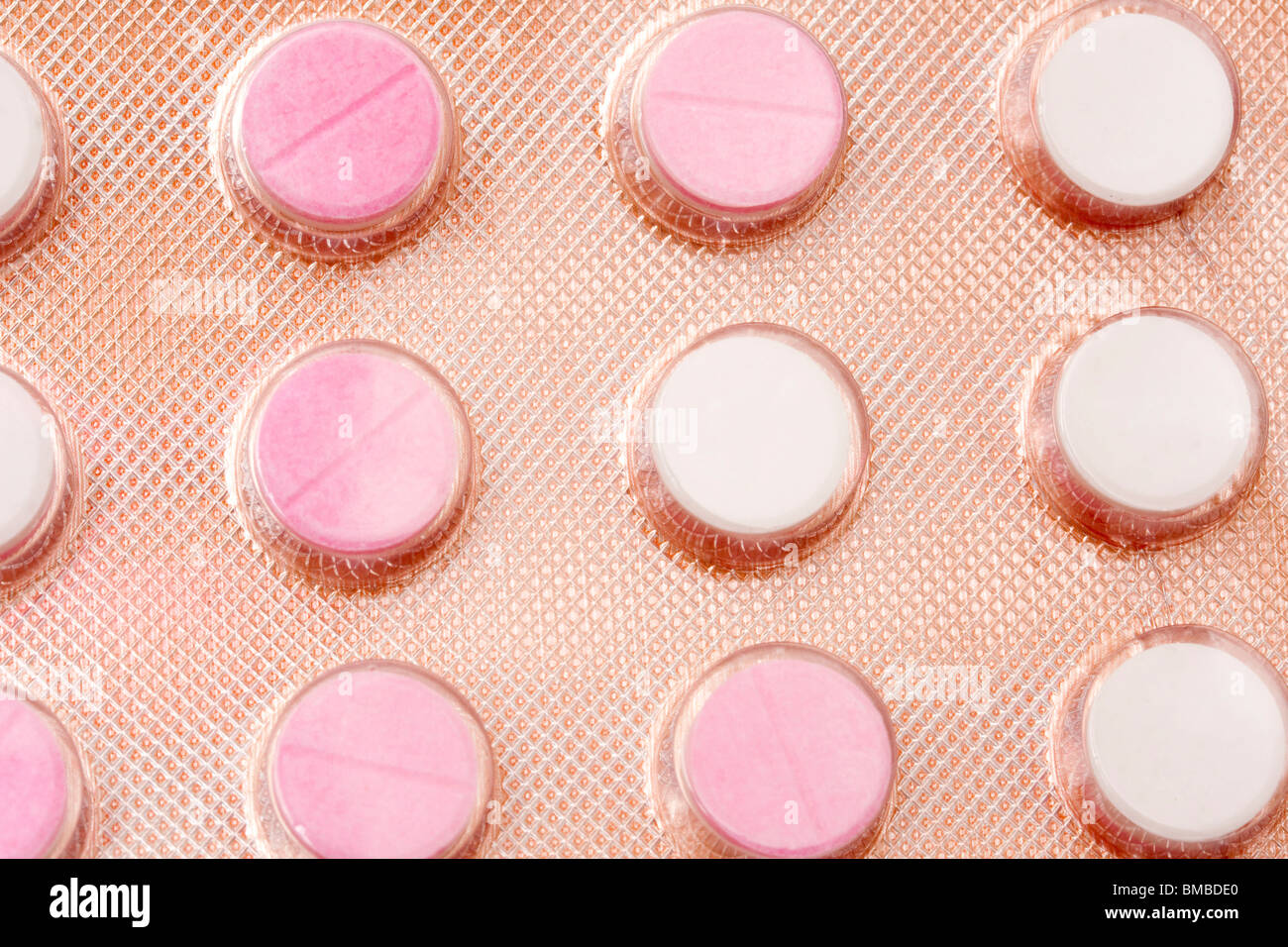 Closeup set of pink pills Stock Photo