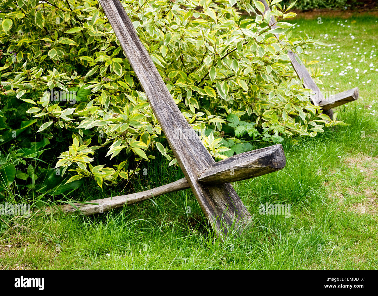 Unusual wooden garden seats in the TWIGS gardens in Swindon, Wiltshire, England, UK Stock Photo