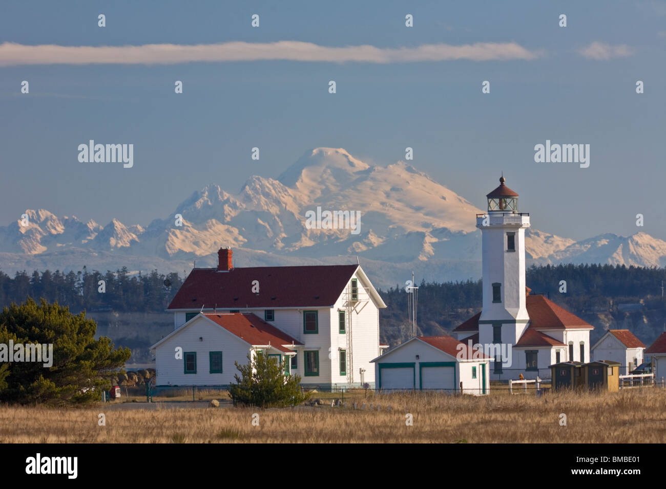 Jefferson County, WA Point Wilson Lighthouse on the Quimper Peninsula with Mount Baker in the 