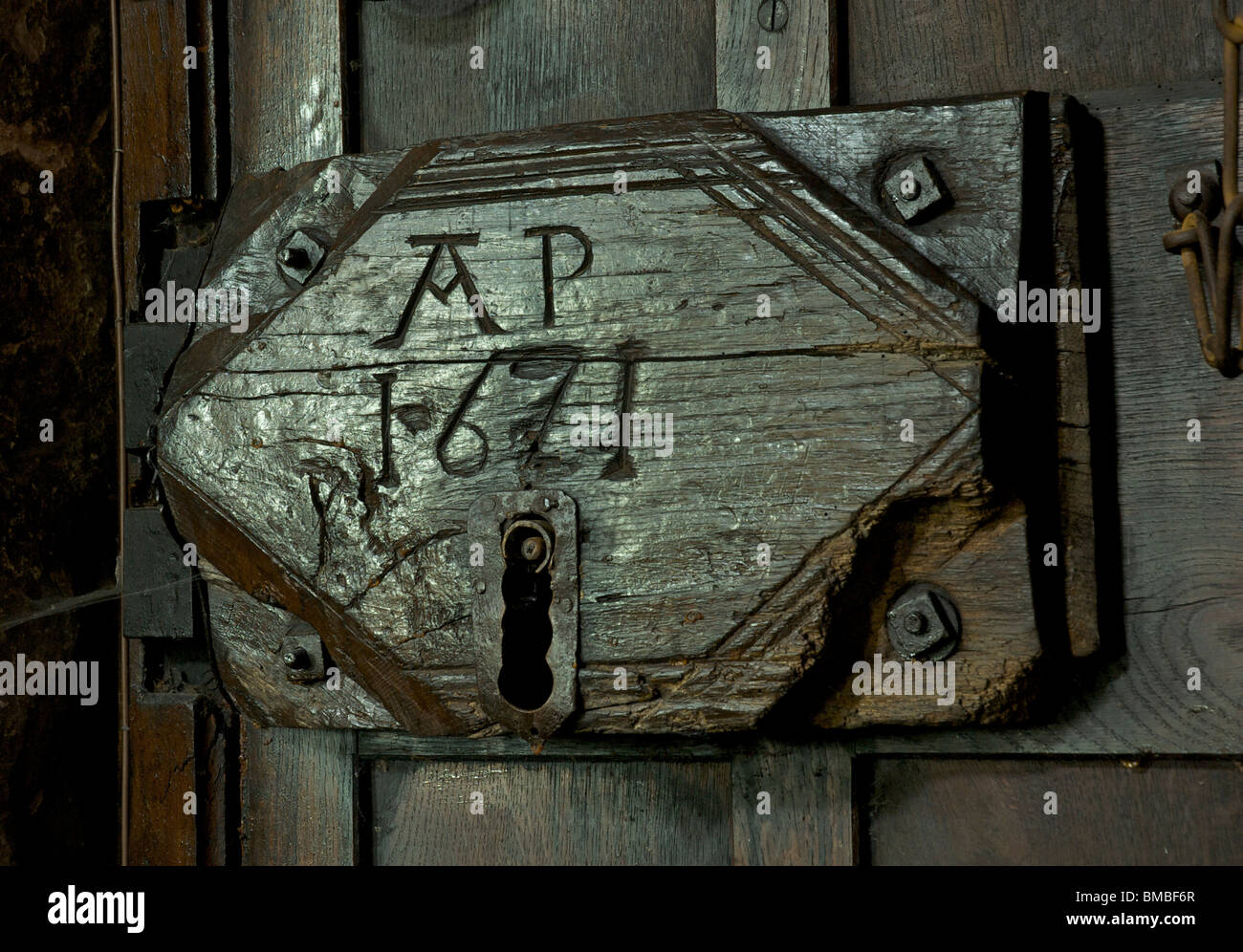 Old wooden lock with initials 'AP' and date, 1671, Dacre church, Lake