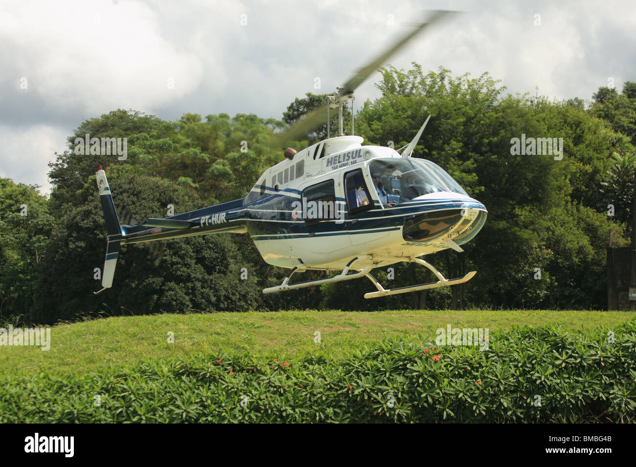 Iguassu Falls sightseeing helicopter coming into land. Stock Photo