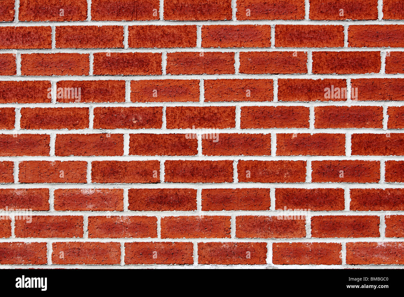 brick wall - periodic whites line on red brick Stock Photo