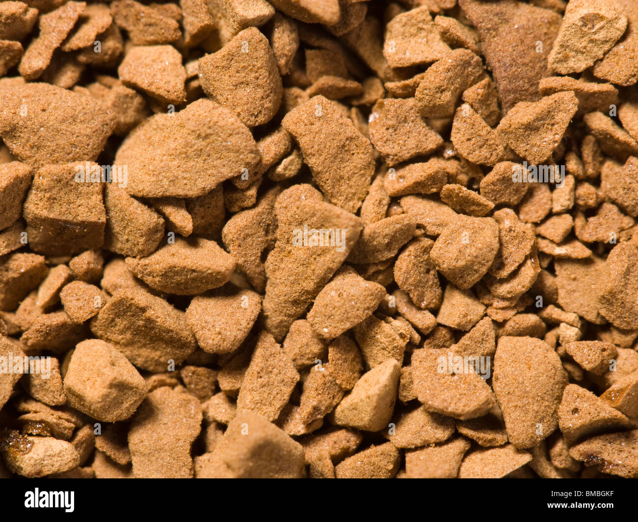 Instant coffee granules in extreme close up Stock Photo