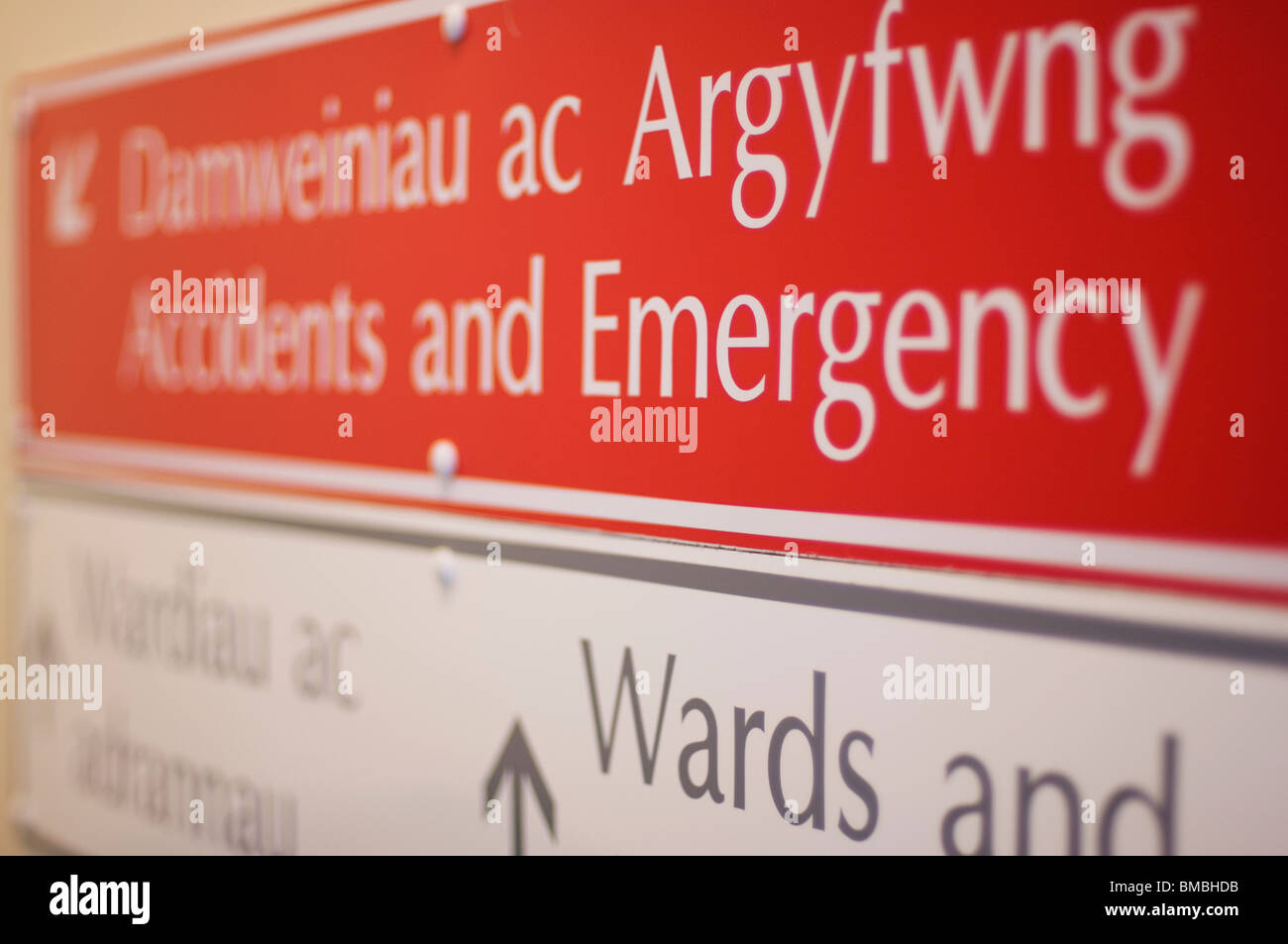 A sign for accidents and emergency in Aberystwyth Bronglais hospital, shot with a shallow depth of field. Stock Photo