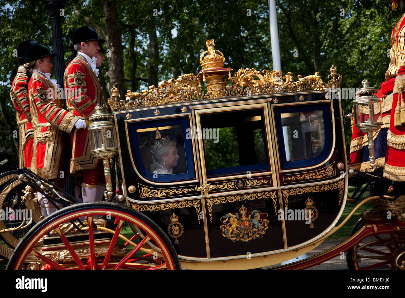 Queen Elizabeth II in the Royal Carriage. Royal procession for the State Opening of Parliament, London. Stock Photo