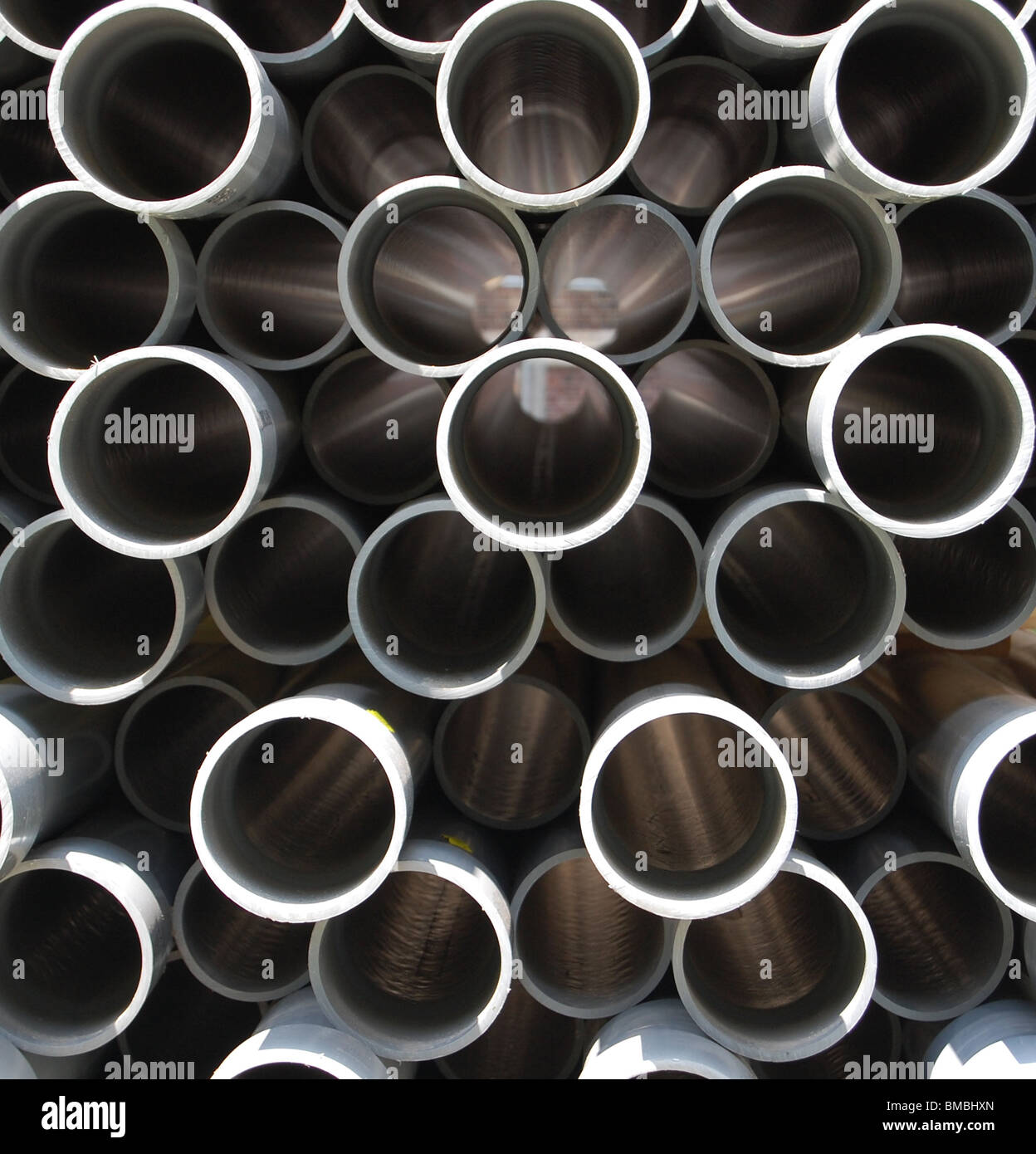 PVC pipes stacked up, cross section Stock Photo Alamy