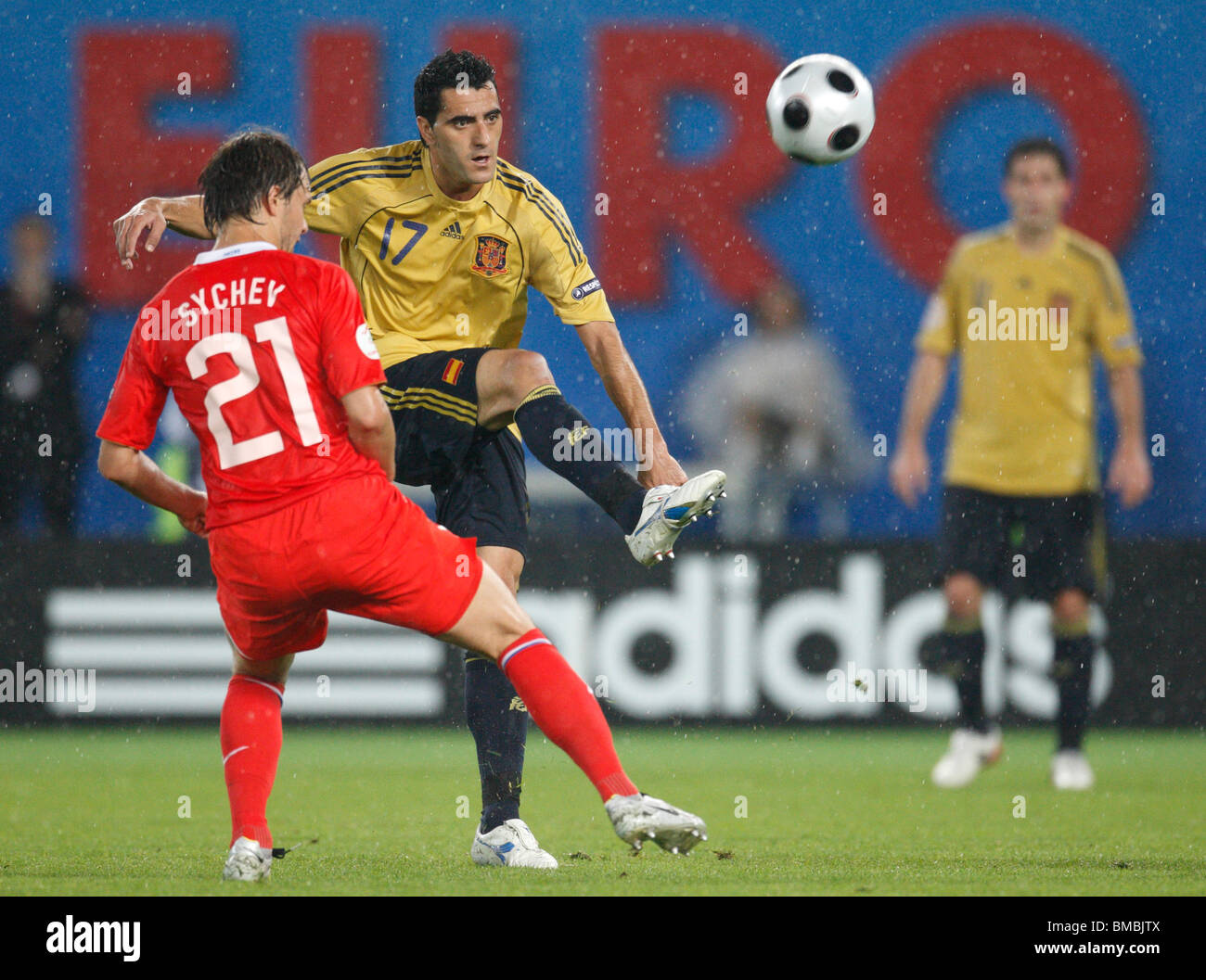 Daniel Güiza of Spain (17) kicks the ball past Dmitri Sychev of Russia (21) during a UEFA Euro 2008 semi-final football match. Stock Photo