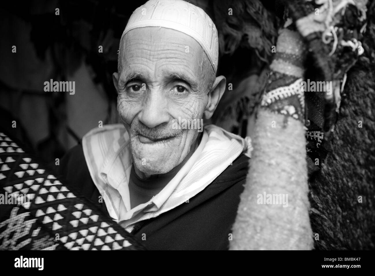 Portrait of rug maker , souk , Marrakesh , Morocco , North Africa Stock