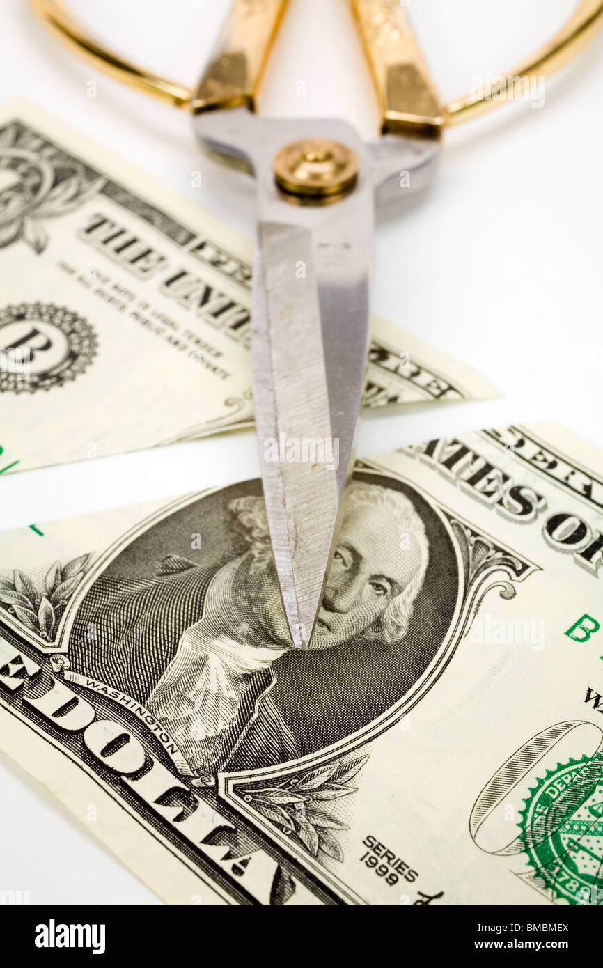 Cutting dollars, concept of Finance Problems, Recession Stock Photo