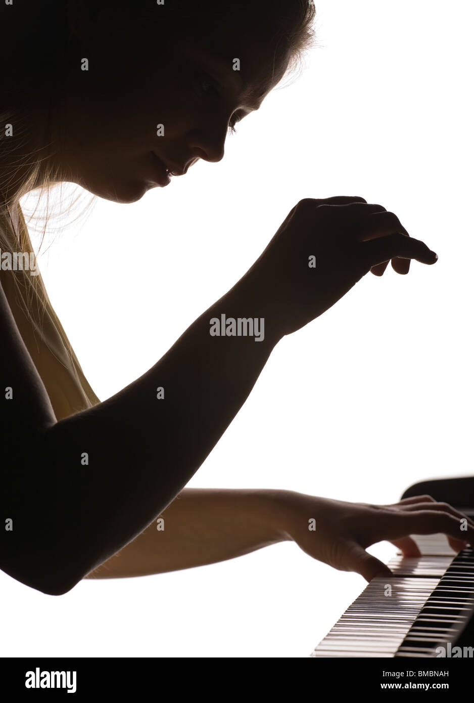 silhouette of beautiful girl playing the grand piano, isolated on white  Stock Photo - Alamy