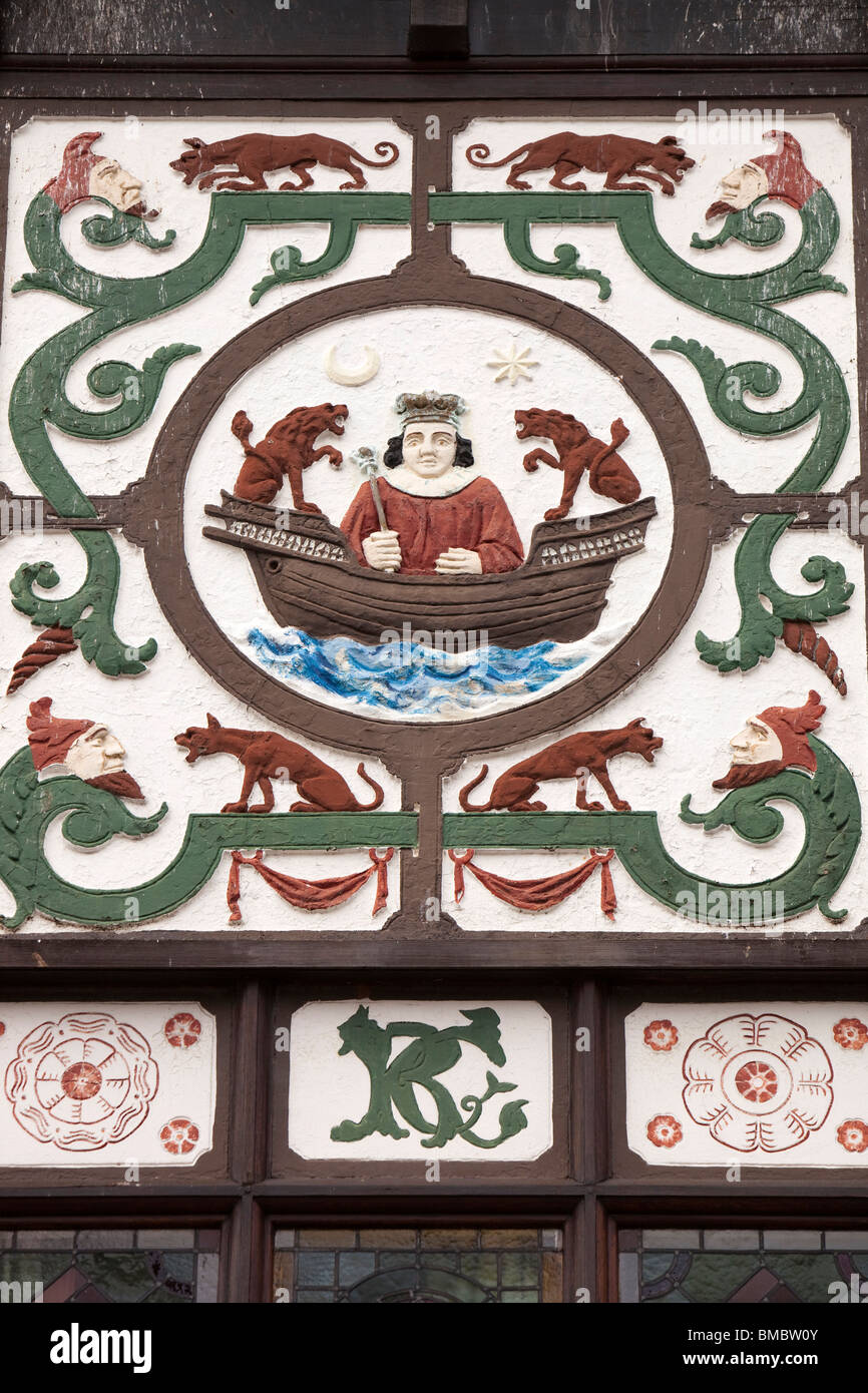 UK, England, Devon, Dartmouth, Lower Street, seafaring heritage painted plaster decoration over timber framed shop Stock Photo