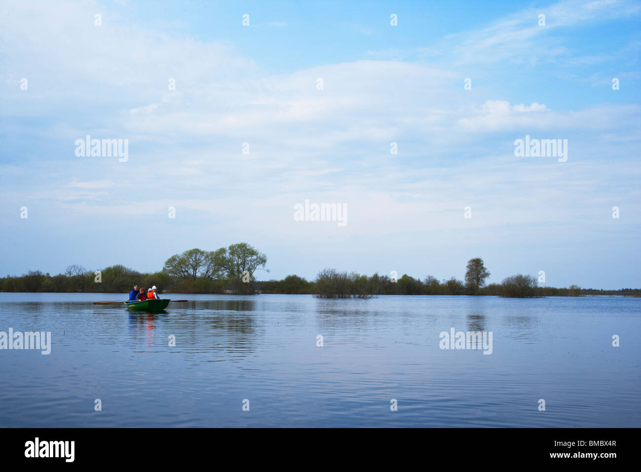 Boat on flooded river Stock Photo - Alamy