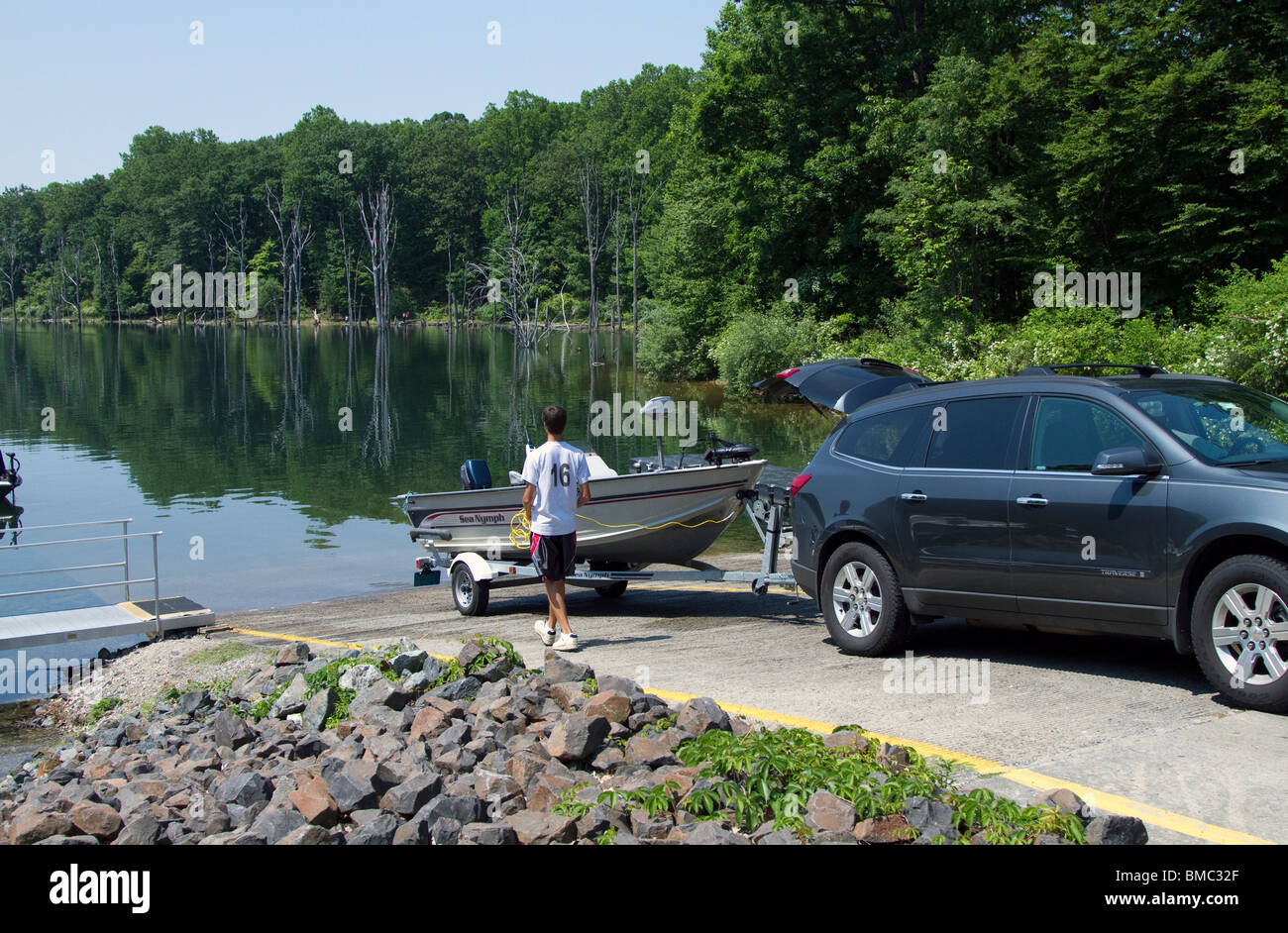 Backing a trailer with boat down a boat launching ramp Stock Photo Alamy Backing a trailer with boat down a boat launching ramp Stock Photo Alamy