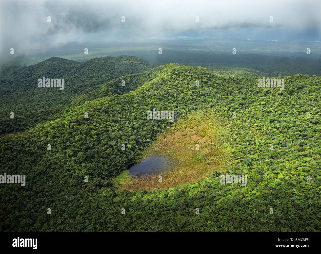 Aerial view of upland tropical forest and crater lake, Savaii, Samoa Stock Photo