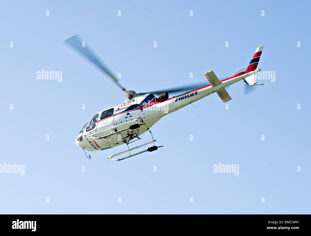 Airlift Helicopter AS Eurocopter 350B LNOCW Taking Off in Clear Skies