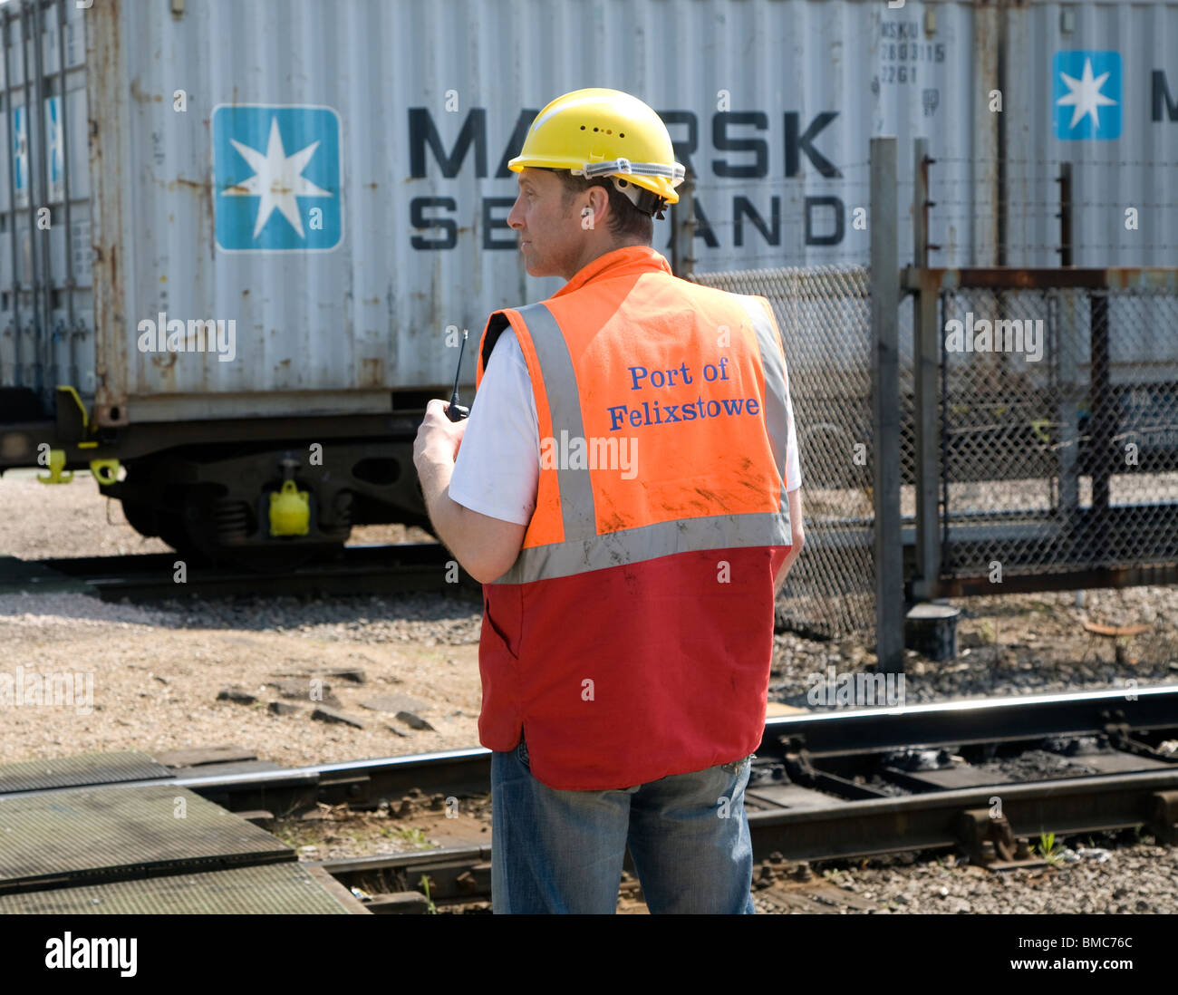 Worker at Rail freight terminal, Port of Felixstowe, Suffolk Stock Photo