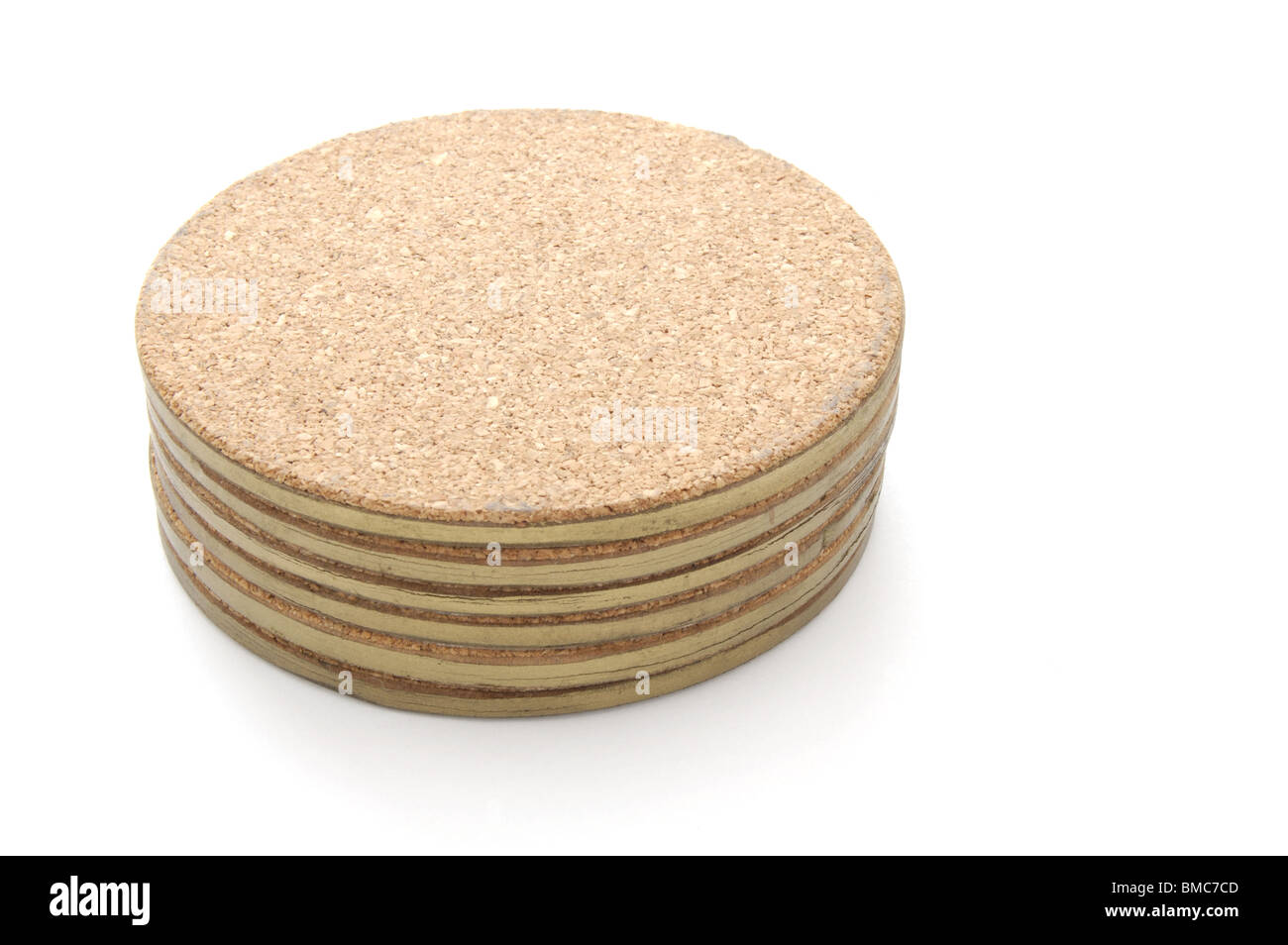 Stack of cork table coasters isolated on a white background Stock Photo