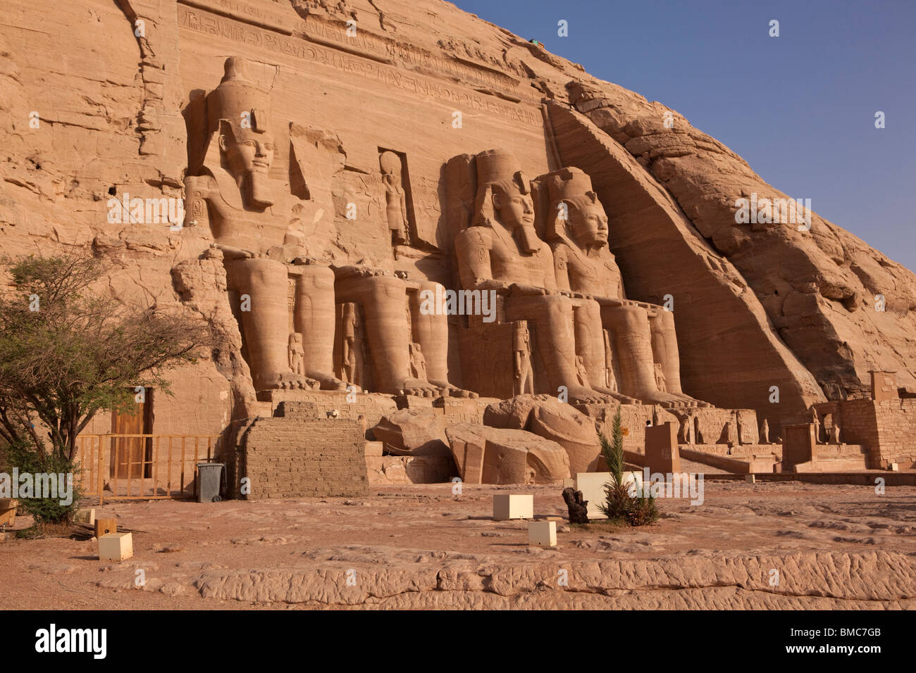 Structures within ancient Egyptian temples and the four statues of Rameses II at Abu Simbel, Egypt Stock Photo