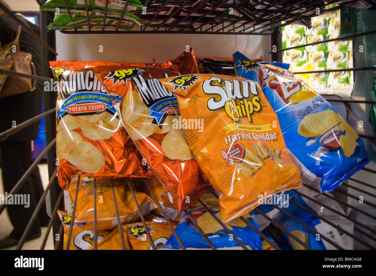 A display of tasty chips and other snacks in a supermarket in New York seen on Saturday, May 8, 2010. (© Richard B. Levine) Stock Photo