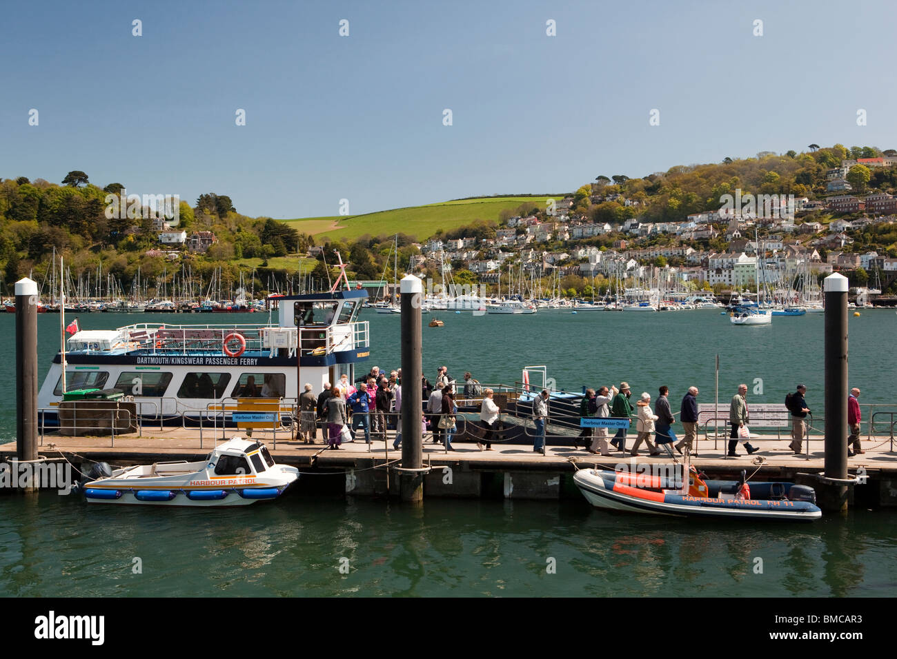 UK, England, Devon, Dartmouth, River Dart jetty, Kingswear passenger ferry passengers disembarking Stock Photo