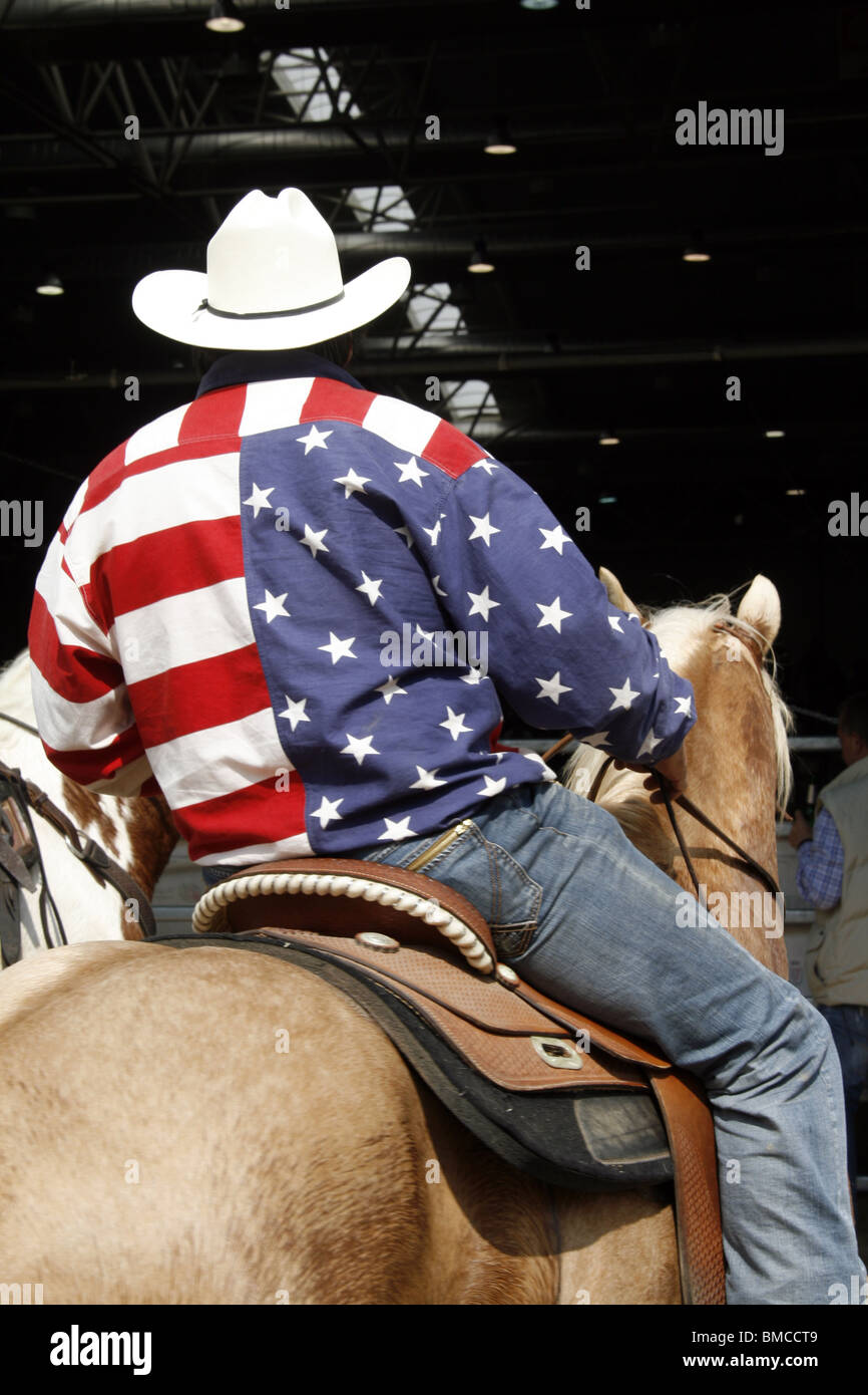 Rider Withe Star cowboy rider riding wearing stars and stripes shirt Stock Photo - Alamy