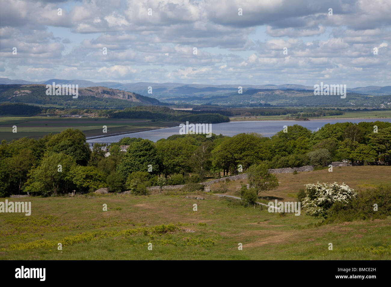 View over the Kent estuary and Milnthorpe sands towards the Cumbrian hills from Arnside Knott, Cumbria. Stock Photo