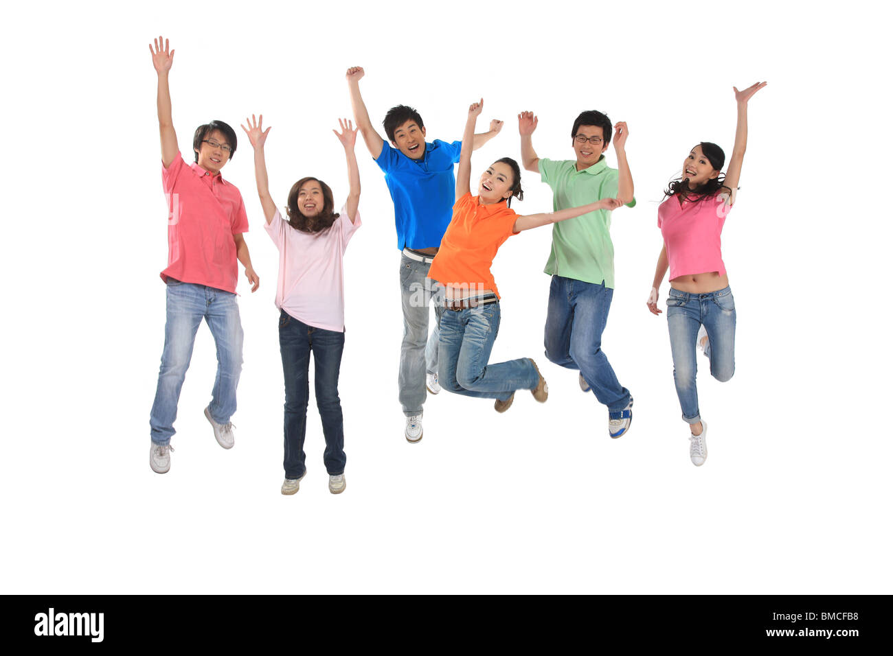 Group of people jumping for joy Stock Photo - Alamy