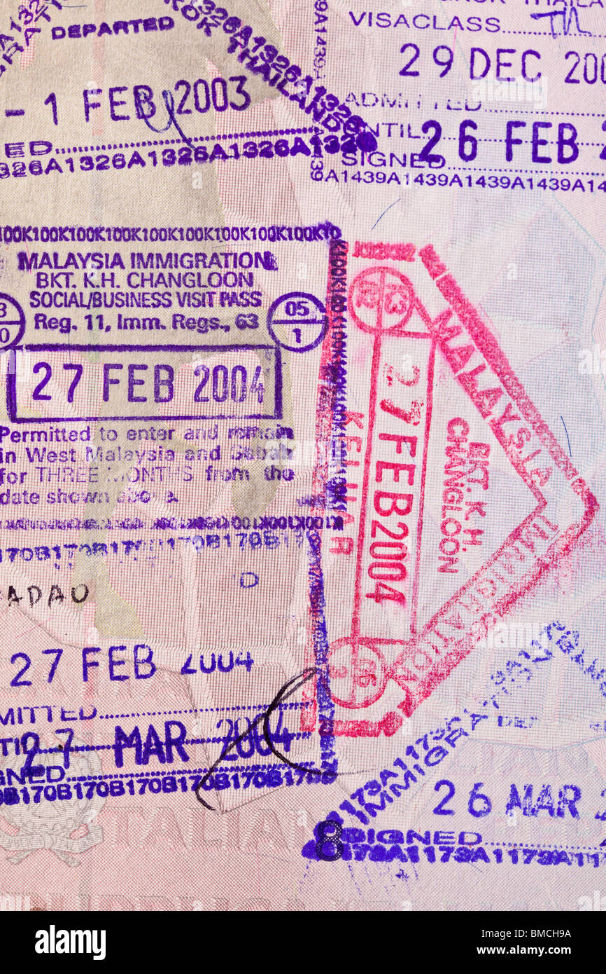 A passport page with many stamps Stock Photo