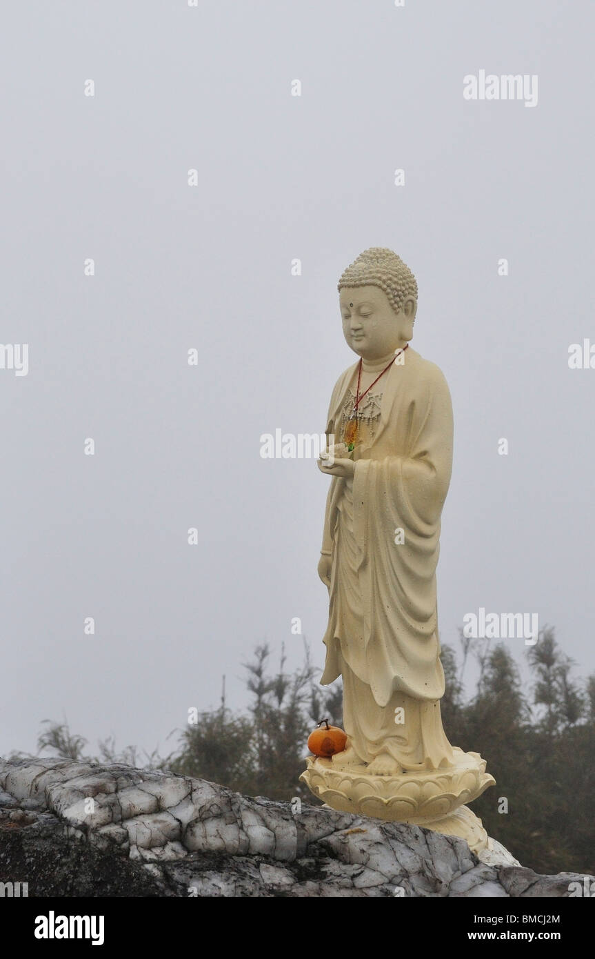 Buddha Statue at Summit of Fansipan, Hoang Lien Mountains, Vietnam Stock Photo