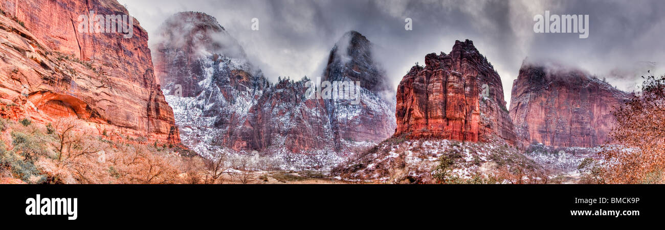 The clouds part after a winter snowstorm at the Great White Throne in southern Utah's famed Zion National Park. Stock Photo